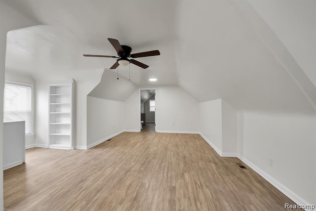 14850 Ilene St, Detroit, MI 48238 - bonus room with built in features, light wood-style flooring, ceiling fan, baseboards, and vaulted ceiling