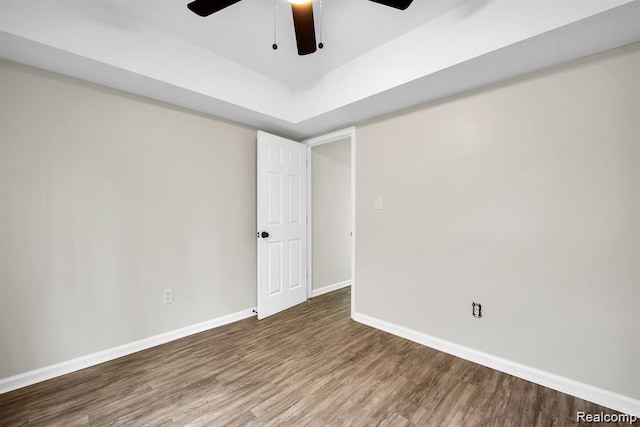 14850 Ilene St, Detroit, MI 48238 - spare room featuring a ceiling fan, wood finished floors, and baseboards