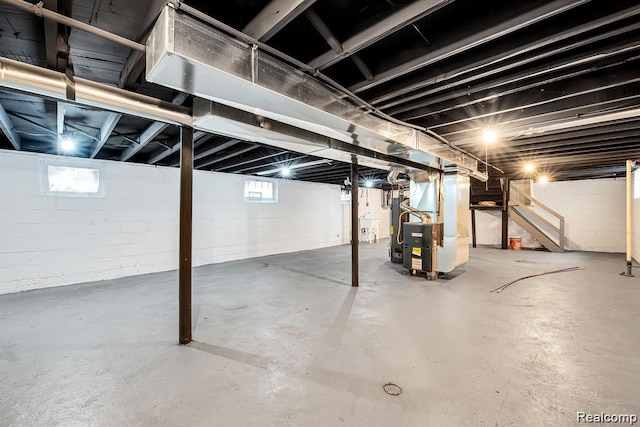 14850 Ilene St, Detroit, MI 48238 - below grade area featuring heating unit and stairs