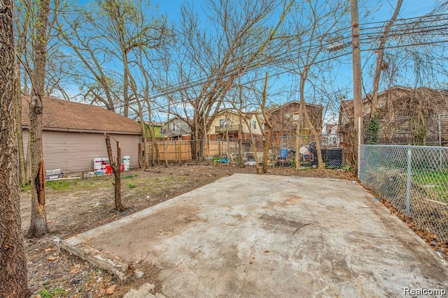 14850 Ilene St, Detroit, MI 48238 - fenced backyard featuring a residential view and a patio area