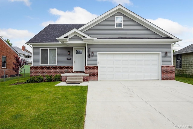 1759 2nd St, Taylor, MI 48192 - view of front of property featuring brick siding, a front lawn, a garage, concrete driveway, and roof with shingles