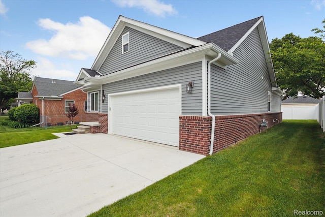 1759 2nd St, Taylor, MI 48192 - view of home's exterior with brick siding and concrete driveway