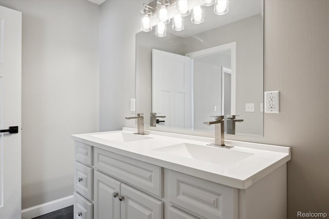 1759 2nd St, Taylor, MI 48192 - bathroom with double vanity and baseboards