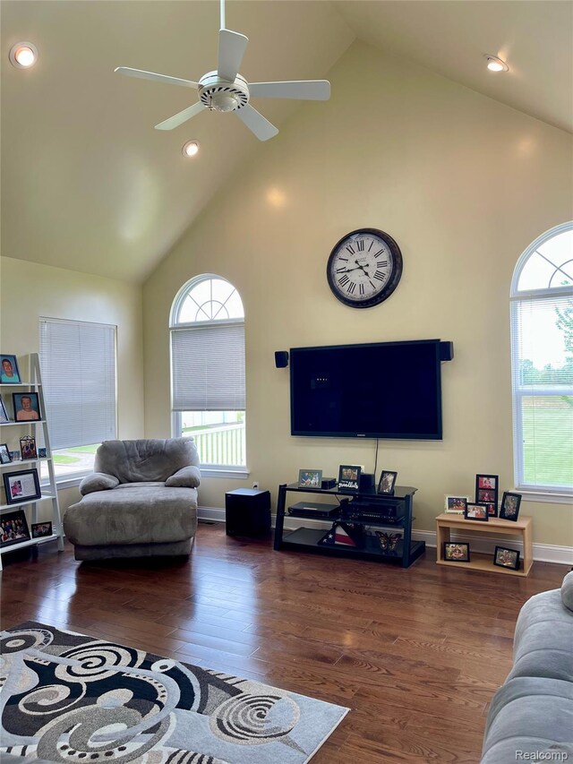 1325 Capac Rd, Berlin, MI 48002 - living area featuring high vaulted ceiling, a ceiling fan, recessed lighting, wood finished floors, and baseboards