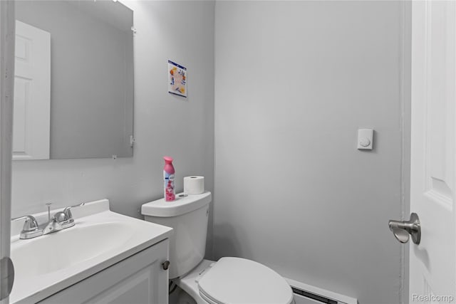18625 Carrie St, Detroit, MI 48234 - bathroom with a baseboard radiator, toilet, and vanity