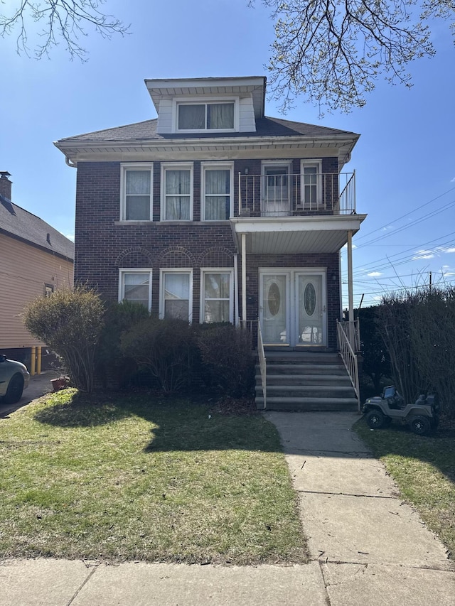 4649 Jonathon St, Dearborn, MI 48126 - traditional style home with a balcony, a front lawn, and brick siding