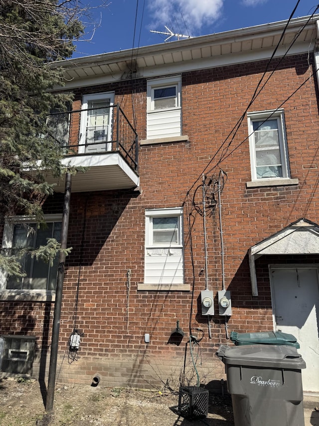 4649 Jonathon St, Dearborn, MI 48126 - view of property exterior featuring a balcony and brick siding