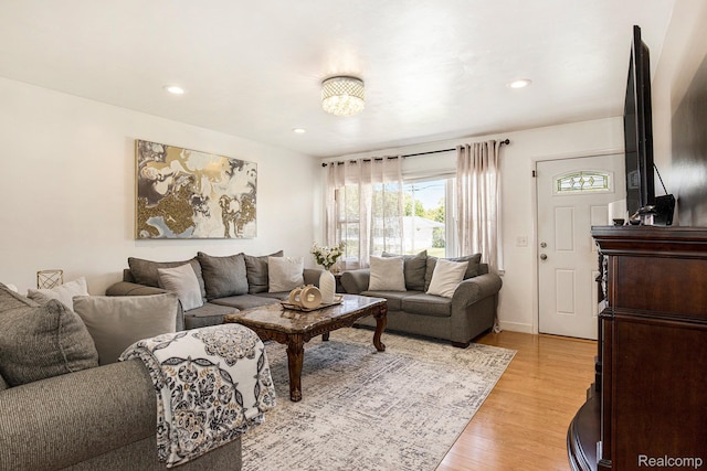 2263 Lawnel Ave, Norton Shores, MI 49441 - living room featuring light wood-style flooring, recessed lighting, and baseboards
