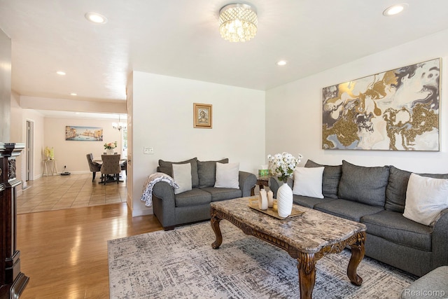 2263 Lawnel Ave, Norton Shores, MI 49441 - living area featuring a chandelier, light wood finished floors, and recessed lighting