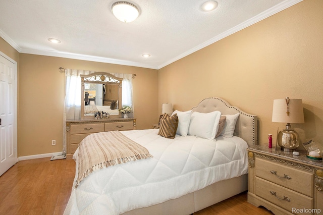2263 Lawnel Ave, Norton Shores, MI 49441 - bedroom with ornamental molding, light wood-type flooring, baseboards, and recessed lighting