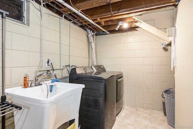 2263 Lawnel Ave, Norton Shores, MI 49441 - laundry room with washing machine and clothes dryer