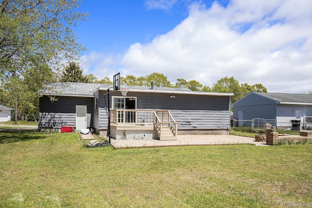 2263 Lawnel Ave, Norton Shores, MI 49441 - rear view of house featuring a wooden deck