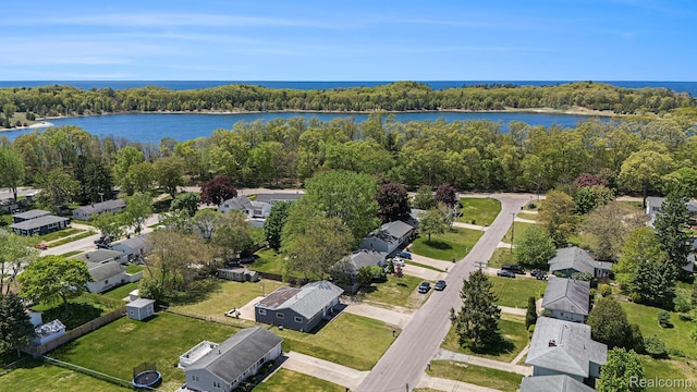 2263 Lawnel Ave, Norton Shores, MI 49441 - aerial view of residential area featuring a nearby body of water and a forest