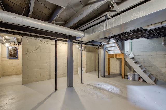 1118 Burr St, Jackson, MI 49201 - unfinished basement featuring stairway