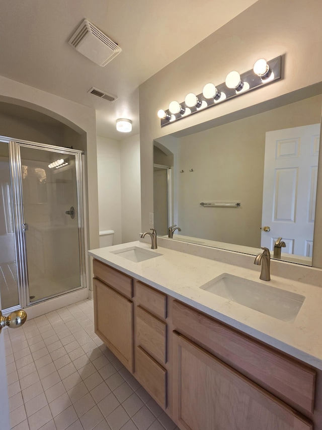 2936 Signature Blvd, Ann Arbor, MI 48103 - bathroom with tile patterned flooring, double vanity, and a shower stall
