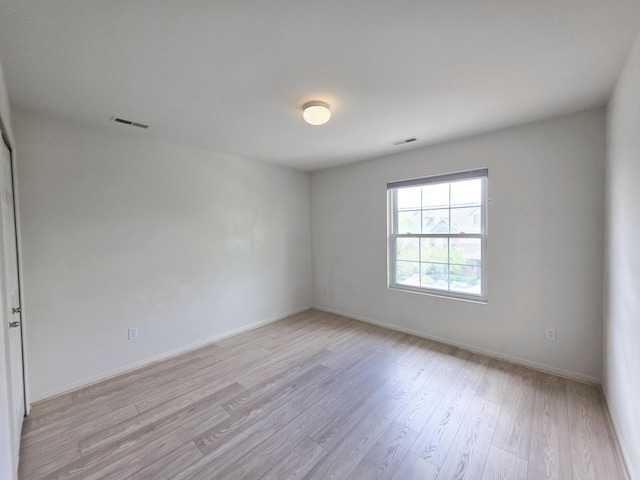 2936 Signature Blvd, Ann Arbor, MI 48103 - empty room featuring light wood-type flooring and baseboards
