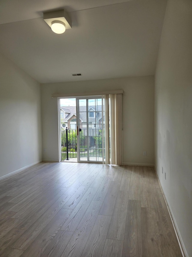 2936 Signature Blvd, Ann Arbor, MI 48103 - unfurnished room featuring wood finished floors and baseboards