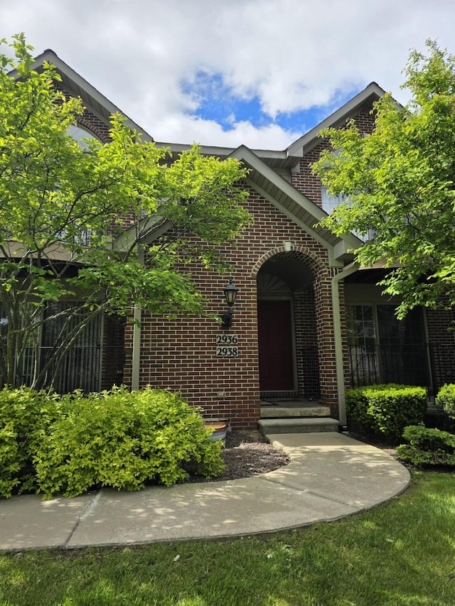 2936 Signature Blvd, Ann Arbor, MI 48103 - doorway to property featuring brick siding
