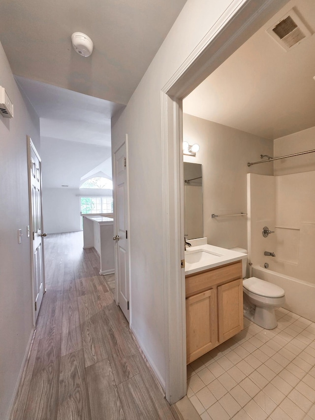 2936 Signature Blvd, Ann Arbor, MI 48103 - bathroom featuring vanity, toilet, and bathing tub / shower combination