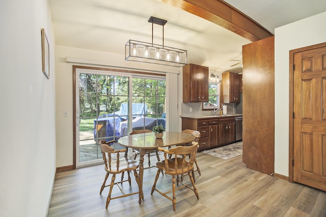 15035 155th Ave, Grand Haven, MI 49417 - dining space with light wood-type flooring and baseboards