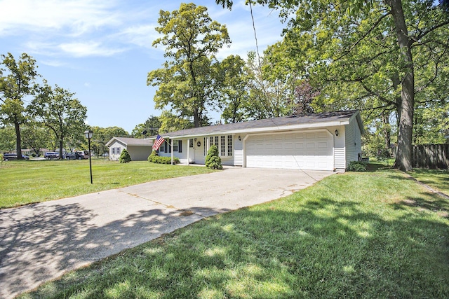 15035 155th Ave, Grand Haven, MI 49417 - ranch-style home with driveway, a garage, and a front lawn