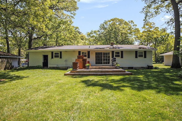 15035 155th Ave, Grand Haven, MI 49417 - rear view of property featuring a deck and a lawn