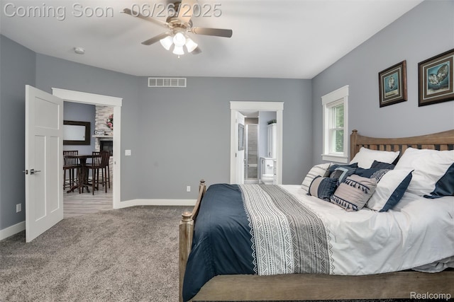 800 Greystone Dr, Chelsea, MI 48118 - carpeted bedroom featuring connected bathroom and a ceiling fan