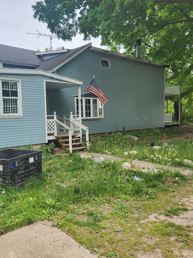 19354 Dutch Settlement St, Cassopolis, MI 49031 - rear view of house featuring central AC unit and a shingled roof
