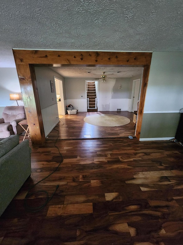 19354 Dutch Settlement St, Cassopolis, MI 49031 - corridor featuring wood finished floors, a textured ceiling, and baseboards