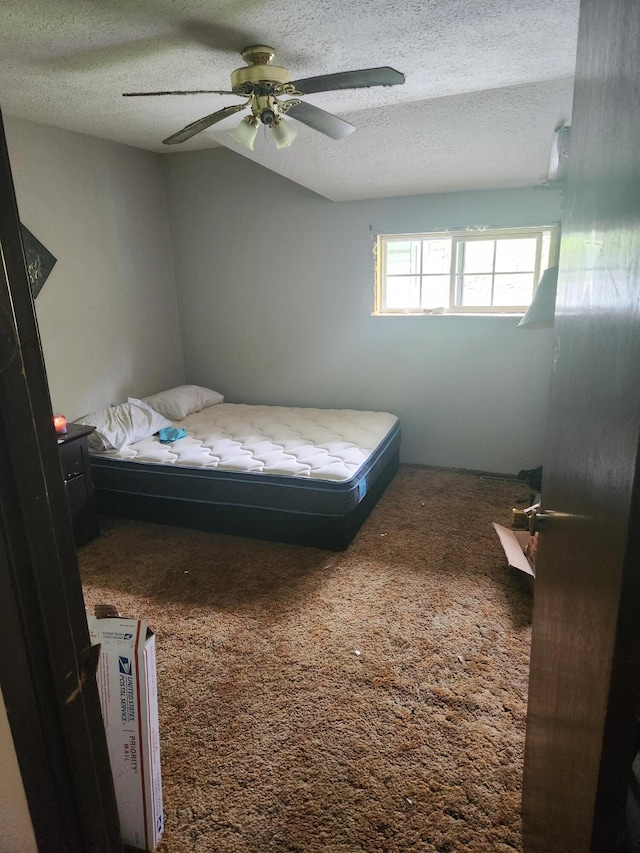 19354 Dutch Settlement St, Cassopolis, MI 49031 - carpeted bedroom with a textured ceiling and ceiling fan