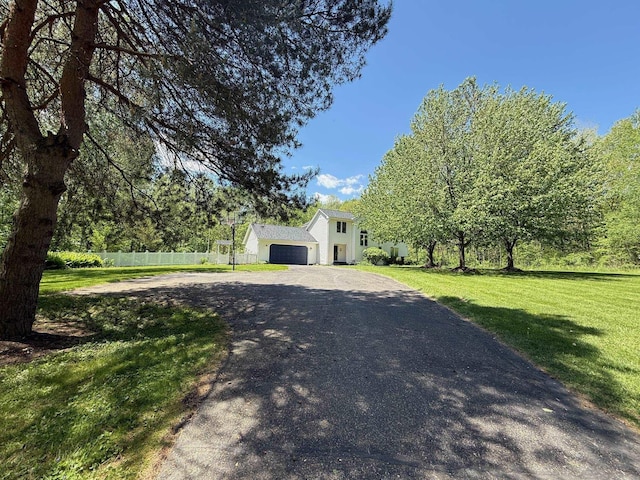 16350 Whitaker Rd, Linden, MI 48451 - view of front of house with driveway and an attached garage