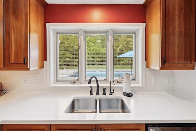 16350 Whitaker Rd, Linden, MI 48451 - kitchen featuring a sink, dishwasher, plenty of natural light, and light countertops