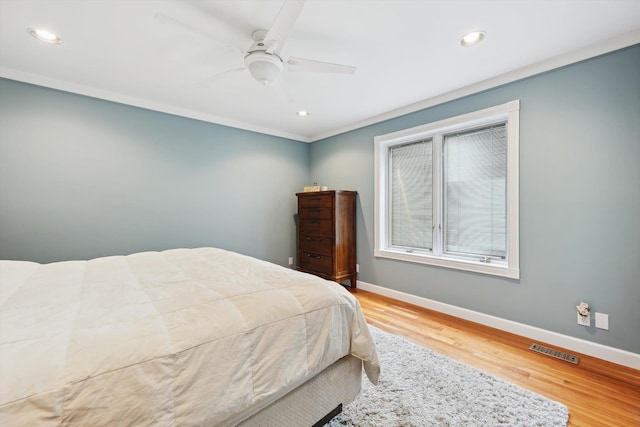 16350 Whitaker Rd, Linden, MI 48451 - bedroom featuring wood finished floors, baseboards, recessed lighting, a ceiling fan, and ornamental molding