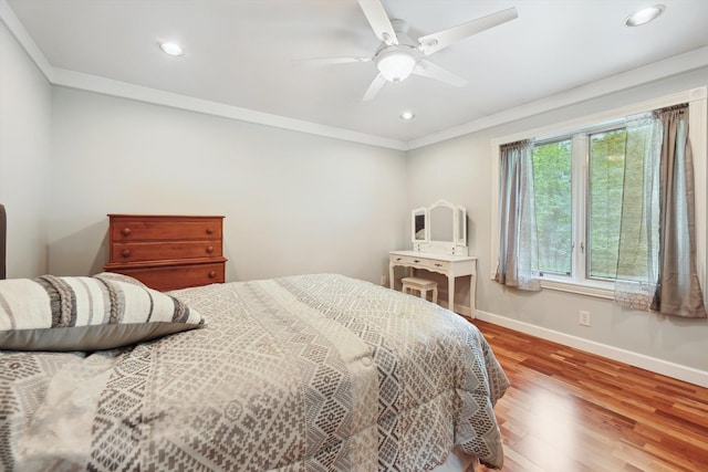 16350 Whitaker Rd, Linden, MI 48451 - bedroom with baseboards, crown molding, wood finished floors, recessed lighting, and ceiling fan