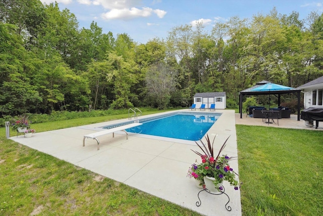 16350 Whitaker Rd, Linden, MI 48451 - swimming pool featuring a patio, a gazebo, a yard, an outbuilding, and a diving board