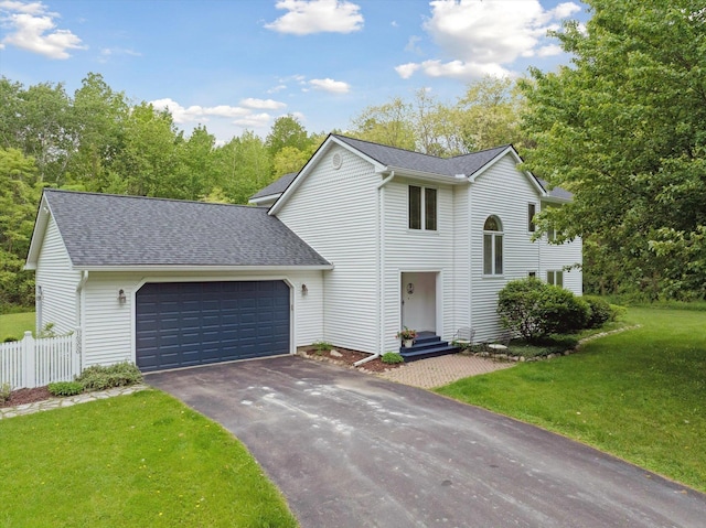 16350 Whitaker Rd, Linden, MI 48451 - traditional home with driveway, an attached garage, and a shingled roof
