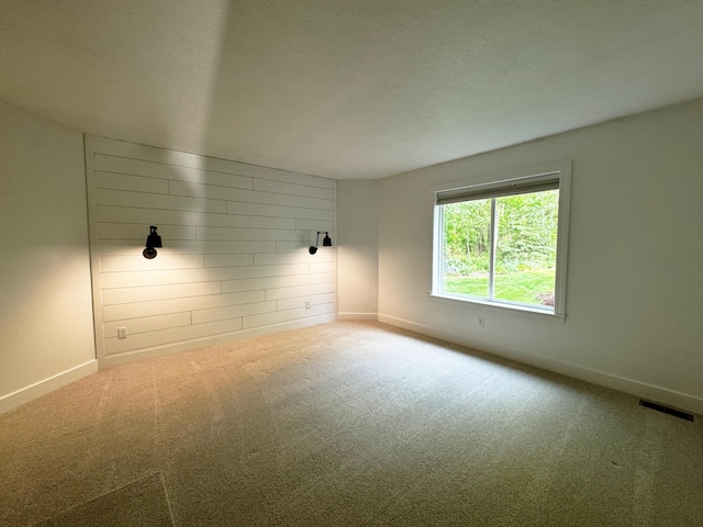 11775 Crystal Ridge Dr NE, Sparta, MI 49345 - carpeted empty room featuring baseboards