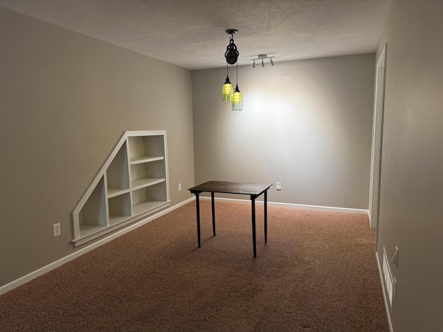 11775 Crystal Ridge Dr NE, Sparta, MI 49345 - unfurnished office featuring carpet floors, a textured ceiling, and baseboards