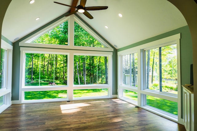 11775 Crystal Ridge Dr NE, Sparta, MI 49345 - unfurnished sunroom featuring lofted ceiling, arched walkways, wood finished floors, and recessed lighting