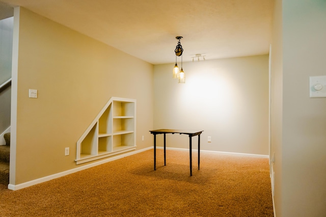 11775 Crystal Ridge Dr NE, Sparta, MI 49345 - unfurnished dining area featuring carpet, stairway, and baseboards