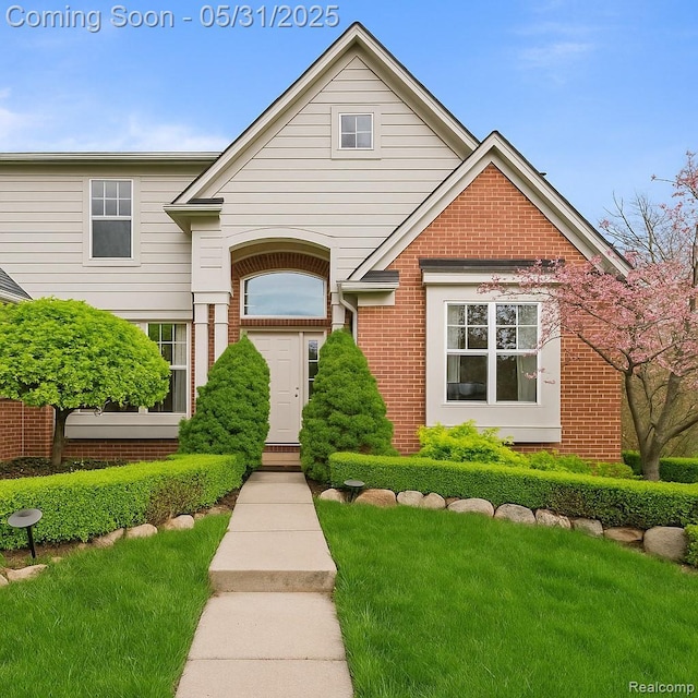 4651 Rosewood Ln, West Bloomfield, MI 48323 - traditional-style house with brick siding and a front lawn