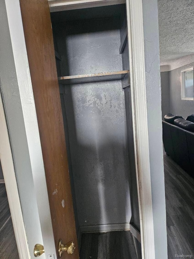 28632 Hazelwood St, Detroit, MI 48141 - detailed view of wood finished floors and a textured ceiling
