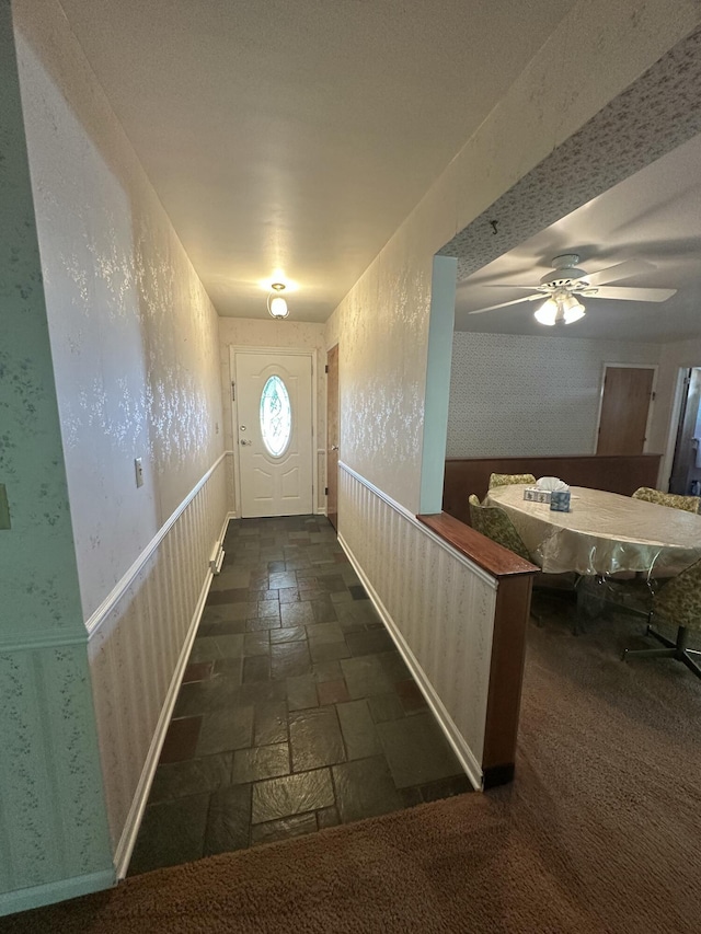 388 Richard St, Spring Arbor, MI 49283 - entryway with stone tile flooring, ceiling fan, and wallpapered walls