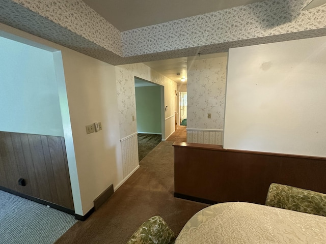 388 Richard St, Spring Arbor, MI 49283 - corridor with carpet, wallpapered walls, and baseboards