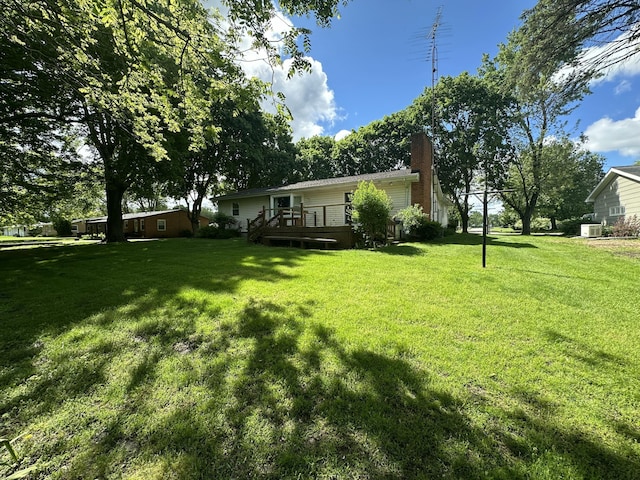 388 Richard St, Spring Arbor, MI 49283 - view of grassy yard featuring a deck