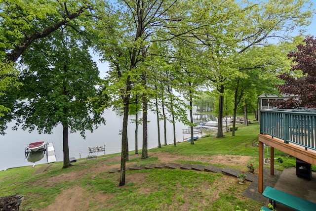 11676 Bradley Dr, Jerome, MI 49249 - view of yard with a deck with water view
