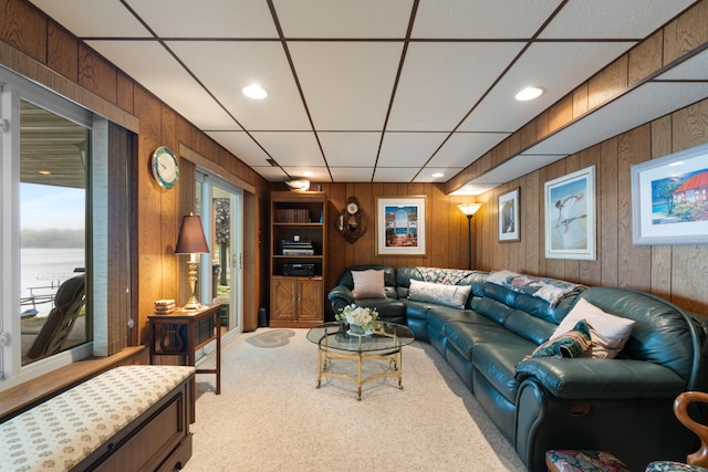 11676 Bradley Dr, Jerome, MI 49249 - living room featuring wooden walls, carpet flooring, a drop ceiling, and recessed lighting