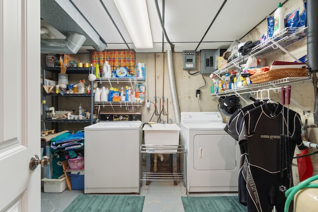 11676 Bradley Dr, Jerome, MI 49249 - laundry room featuring washer and clothes dryer and electric panel