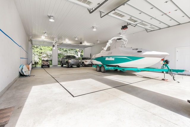 67881 Edgewater Beach Rd, White Pigeon, MI 49099 - garage featuring a garage door opener