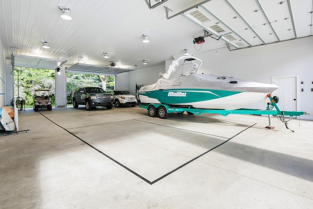 67881 Edgewater Beach Rd, White Pigeon, MI 49099 - garage featuring a garage door opener